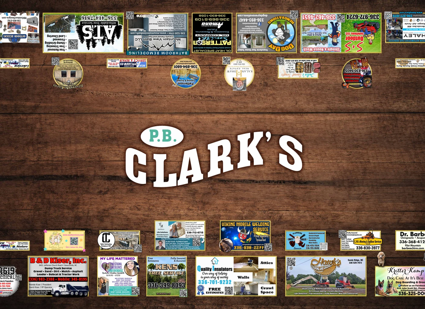 P.B. Clark's tabletop — white logo on warm wood