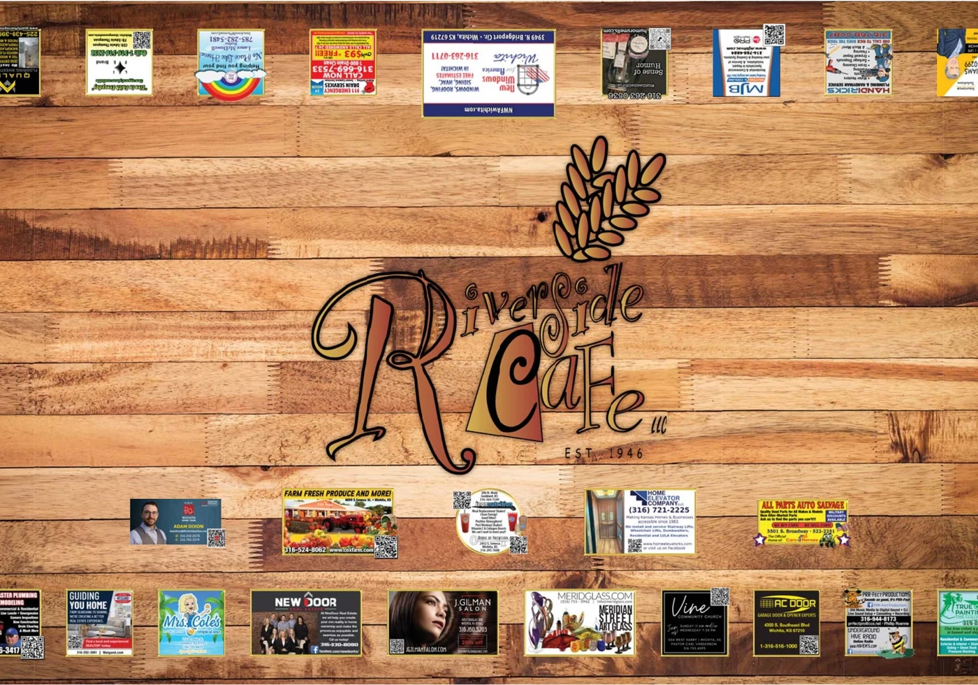 Riverside Cafe tabletop — warm wood planks with wheat logo